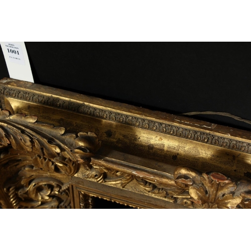 1001 - A 19th century carved wood frame with locking inner front ornament, rebate size 12  x 16 , 31cm x 40... 