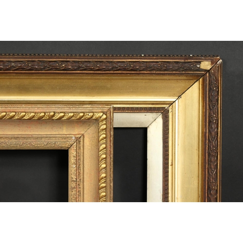 1013 - A 19th century gilt composition frame, rebate size 24  x 36 , 61cm x 91.5cm along with a 20th centur... 