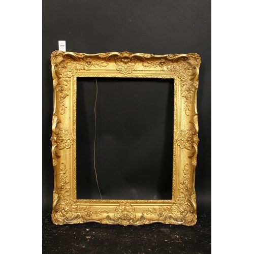 1018 - An early 20th century gilt composition frame, rebate size 16  x 20 , 40.5 cm x 51 cm.