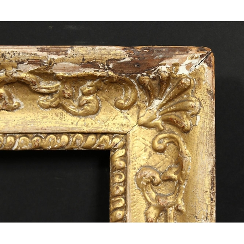 1019 - An early gilt composition frame with moulded inner ornament, wide rebate 16  x 13 , 40.5cm x 33cm.