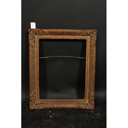 1020 - An early 20th century composition frame, rebate size 14  x 18 , 35.5cm x 45.5cm.