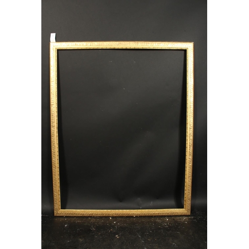 1022 - A 19th century gilt composition frame with Guilloche motif, rebate size 36  x 45.75 , 92cm x 116.5cm... 