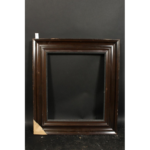 1023 - A Dutch style dark wood frame with ripple moulding, rebate size 20.5  x 24.5 , 52cm x 62cm.