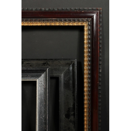 1024 - A Dutch style ripple moulded frame, rebate size 24.5  x 32.5 , 62cm x 83cm along with two ebonised f... 