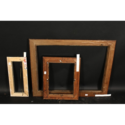 1024 - A Dutch style ripple moulded frame, rebate size 24.5  x 32.5 , 62cm x 83cm along with two ebonised f... 