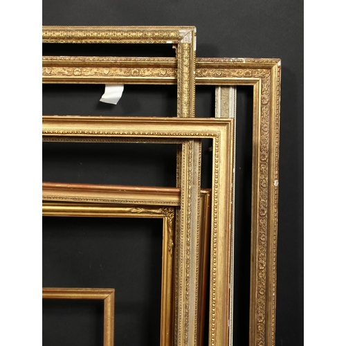 1026 - A group of eight moulded and composition frames of various designs, sizes from 21.5  x 29.5  to 10  ... 