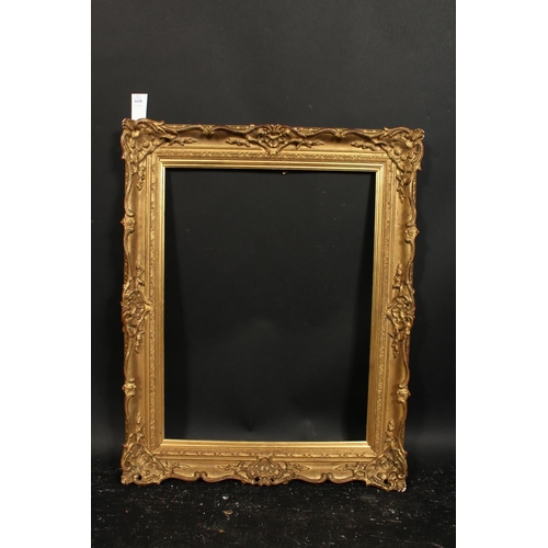 1028 - A 20th century gilt composition frame, rebate size 18  x 24 , 46cm x 61cm.