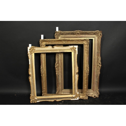 1032 - A group of three gilt composition frames 19th century and later, rebate sizes 19.5  x 23, 49.5cm x 5... 