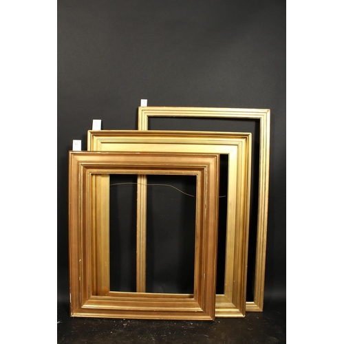 1036 - A group of three early 20th century moulded frames, rebate sizes 21.5  x 25.75 , 54cm x 65cm, 25  x ... 