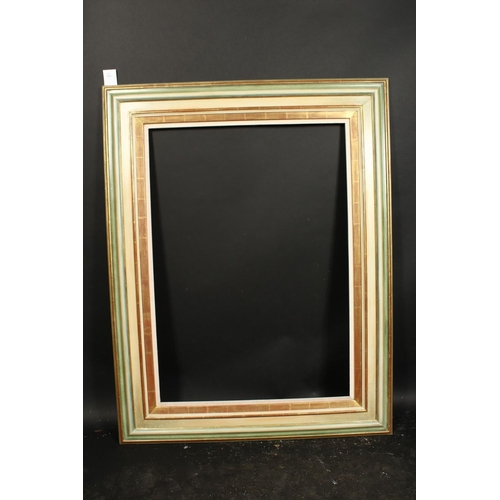 1038 - A 20th century moulded frame, rebate size 29  x 41 , 73.5cm x 104cm.