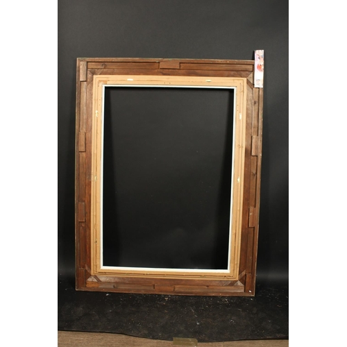 1038 - A 20th century moulded frame, rebate size 29  x 41 , 73.5cm x 104cm.