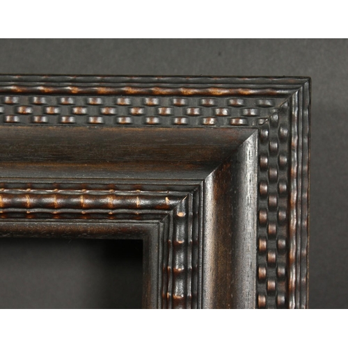 1039 - A Dutch style ripple moulded frame, rebate size 26  x 45 , 66cm x 115cm.