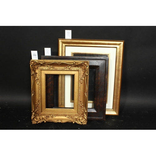 1044 - A group of three 20th century frames, rebate sizes 6.5  x 8 , 16.5xm x 20cm, 8.5  x 11.5 , 21.5cm x ... 