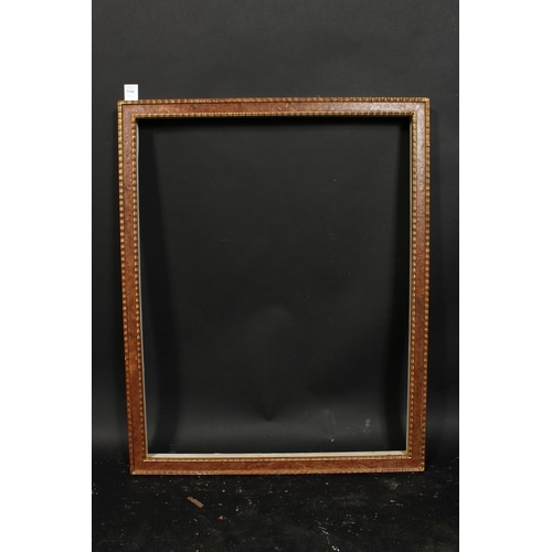 1048 - A Burr wood frame with ripple moulding, rebate size 23  x 29.25 , 58.5cm x 74cm.