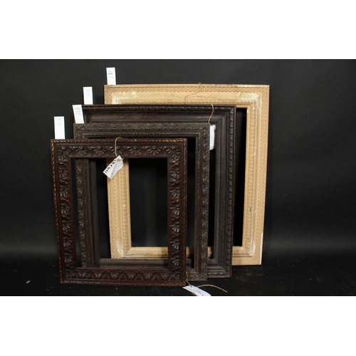1054 - A Dutch style ripple moulded frame, rebate size 17.75  x 21.5 , 45cm x 55cm, along with a group of t... 