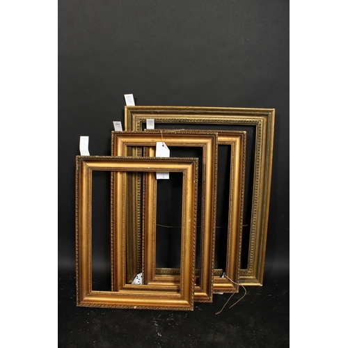 1055 - A pair early 20th century gilt composition frames, rebate size each 11.75  x 21.5 , 30cm x 55cm, alo... 