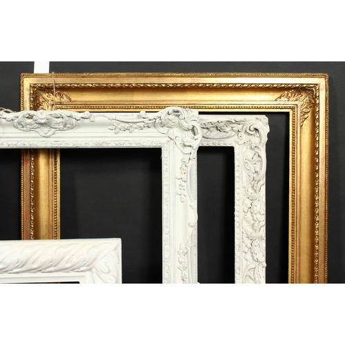 1056 - A group of four early 20th century frames of various styles, rebate size 12.75  x 19 , 32cm x 48cm, ... 