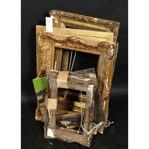 1057 - A group of eight smaller gilt composition frames and slips, various sizes.