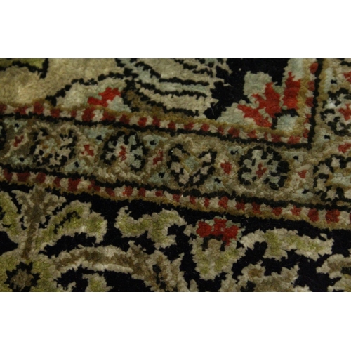 1002 - A  PERSIAN SILK RUG, beige ground with all over floral decoration. 5ft 6ins x 3ft 8ins