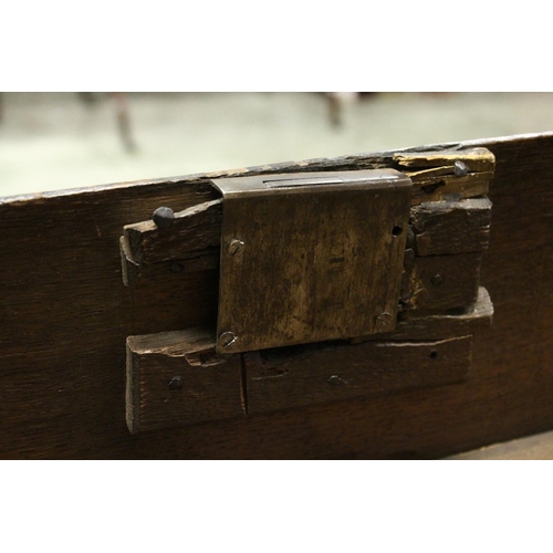 1013 - AN 18TH CENTURY DUTCH WALNUT AND MARQUETRY CABINET ON CHEST with a shaped cornice above a single gla... 