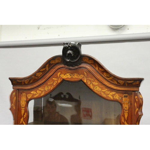 1013 - AN 18TH CENTURY DUTCH WALNUT AND MARQUETRY CABINET ON CHEST with a shaped cornice above a single gla... 