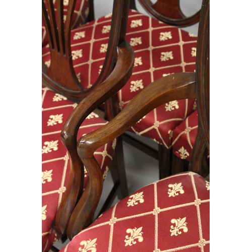 1016 - A SET OF EIGHT GEORGE III MAHOGANY DINING CHAIRS, two with arms, all with shield shaped backs, pierc... 