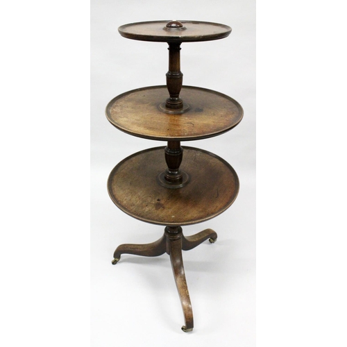 1019 - A GEORGE III MAHOGANY THREE TIER DUMB WAITER with three graduated, circular revolving platforms on a... 