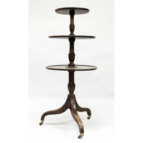 1019 - A GEORGE III MAHOGANY THREE TIER DUMB WAITER with three graduated, circular revolving platforms on a... 