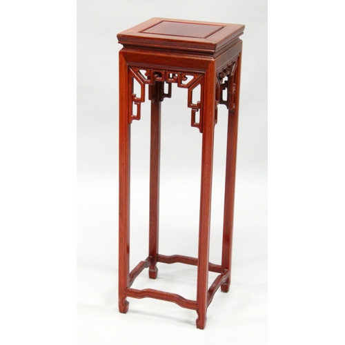 1024 - A 20TH CENTURY CHINESE REDWOOD SQUARE SHAPED TALL STAND. 1ft wide x 3ft high.