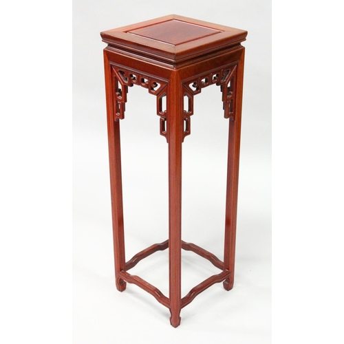 1024 - A 20TH CENTURY CHINESE REDWOOD SQUARE SHAPED TALL STAND. 1ft wide x 3ft high.