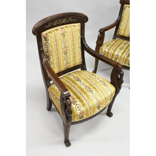 1030 - A GOOD PAIR OF FRENCH EMPIRE MAHOGANY OPEN ARMCHAIRS with reeded curving and cresting rails, upholst... 