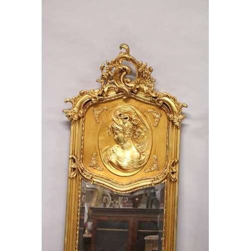 1031 - A LONG PAIR OF UPRIGHT GILT MIRRORS 5ft 9ins long x 1ft 8ins wide.