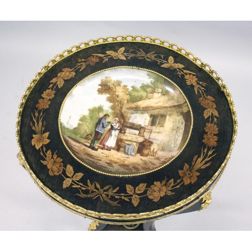 1032 - A FRENCH STYLE CIRCULAR MARQUETRY AND ORMOLU GEURIDON, inset with a porcelain bowl, painted with a r... 