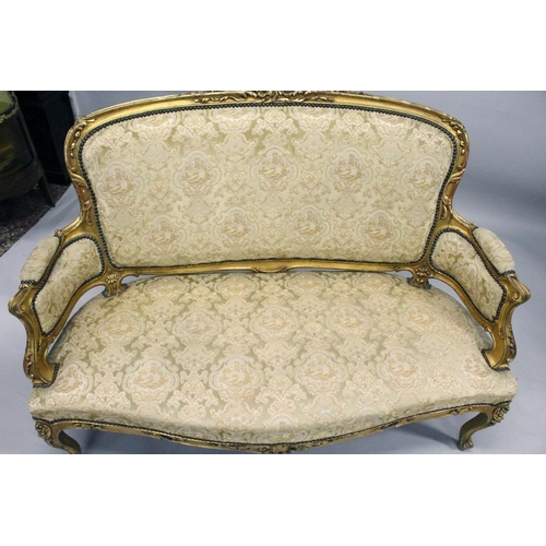 1035 - A 19TH CENTURY FRENCH GILTWOOD FRAMED CANAPE, with carved frame and classical cream upholstery. 4ft ... 