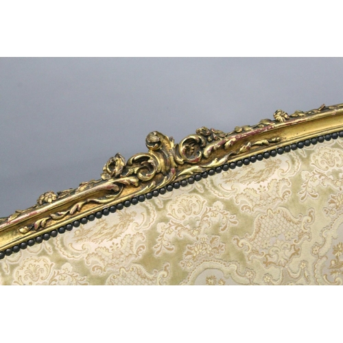 1035 - A 19TH CENTURY FRENCH GILTWOOD FRAMED CANAPE, with carved frame and classical cream upholstery. 4ft ... 