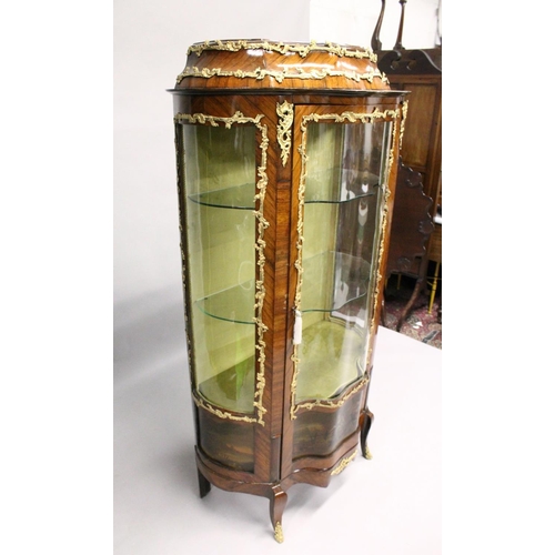 1036 - A 19TH CENTURY FRENCH ROSEWOOD AND ORMOLU MOUNTED VITRINE with a shaped single three quarter glazed ... 