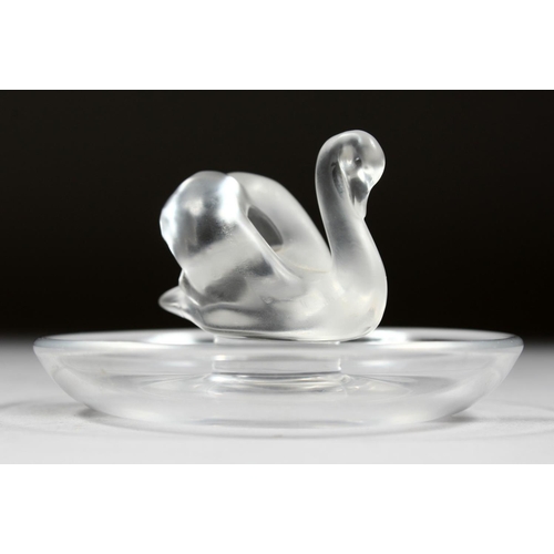 1058 - A LALIQUE SWAN ASHTRAY, 3.5ins diameter.