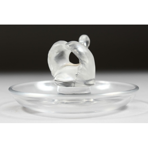 1058 - A LALIQUE SWAN ASHTRAY, 3.5ins diameter.