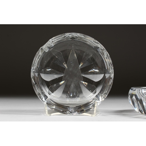 1060 - A HEAVY BACCARAT CIRCULAR GLASS ASHTRAY, 4ins diameter, and ANOTHER, 5ins diameter. (2).