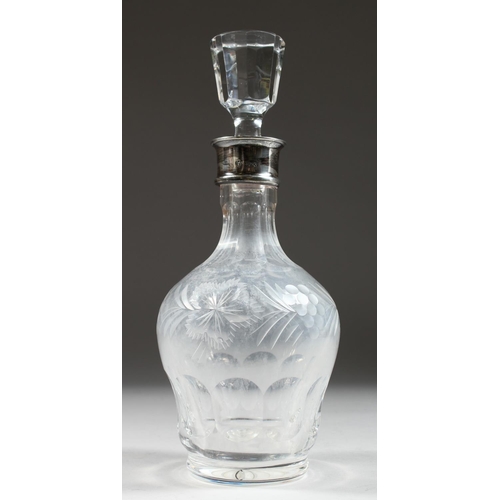 1063 - A VERY GOOD CUT GLASS DECANTER AND STOPPERS with fruiting vines and silver band.