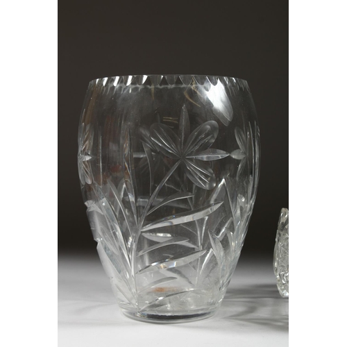 1066 - A LARGE CUT GLASS FLOWER VASE 10ins high and a CIRCULAR CUT GLASS BOWL, 8ins diameter (2).