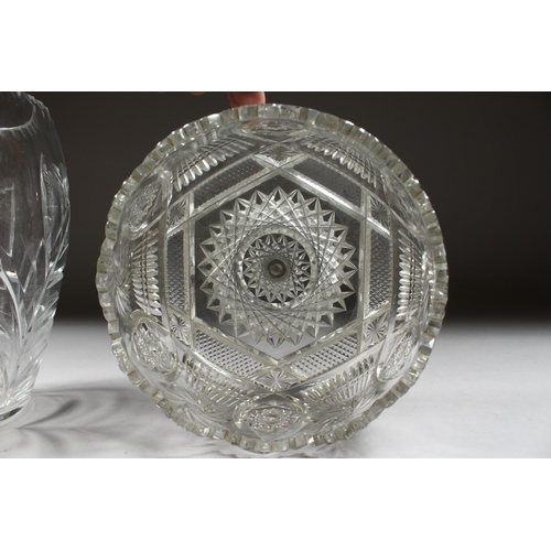 1066 - A LARGE CUT GLASS FLOWER VASE 10ins high and a CIRCULAR CUT GLASS BOWL, 8ins diameter (2).