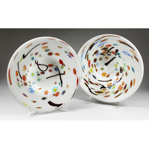 1068 - A PAIR OF LARGE MODERN CIRCULAR SHALLOW DISHES, white opaque ground with colourful decoration. 1ft 6... 