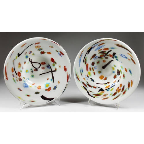 1068 - A PAIR OF LARGE MODERN CIRCULAR SHALLOW DISHES, white opaque ground with colourful decoration. 1ft 6... 