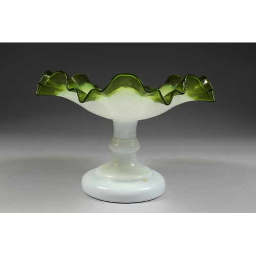 1069 - A ViCTORIAN OPAQUE AND TINTED GREEN GLASS FRILLY EDGE COMPORT, the central base stamped with initial... 