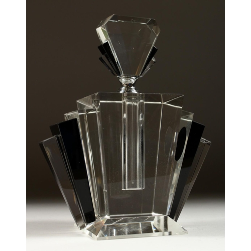 1072 - AN ART DECO STYLE HEAVY GLASS SCENT BOTTLE AND STOPPER. 9.5ins high.