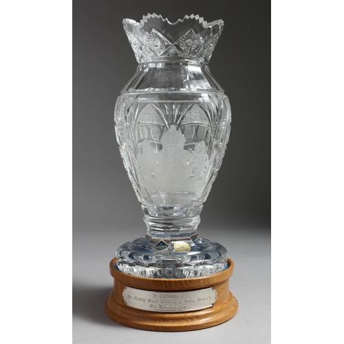 1076 - A SUPERB BOHEMIAN CUT CRYSTAL VASE on a wooden stand, in celebration of Her Majesty Queen Elizabeth,... 