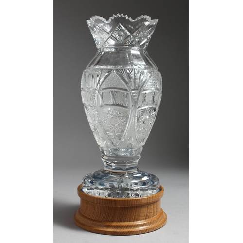 1076 - A SUPERB BOHEMIAN CUT CRYSTAL VASE on a wooden stand, in celebration of Her Majesty Queen Elizabeth,... 