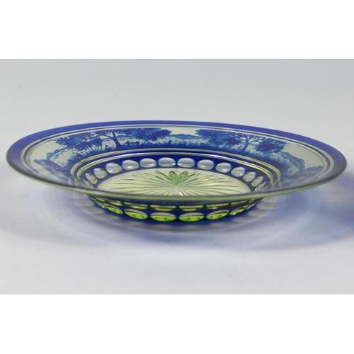 1084 - A BOHEMIAN BLUE TINTED BOWL AND STAND with a landscaped decoration.