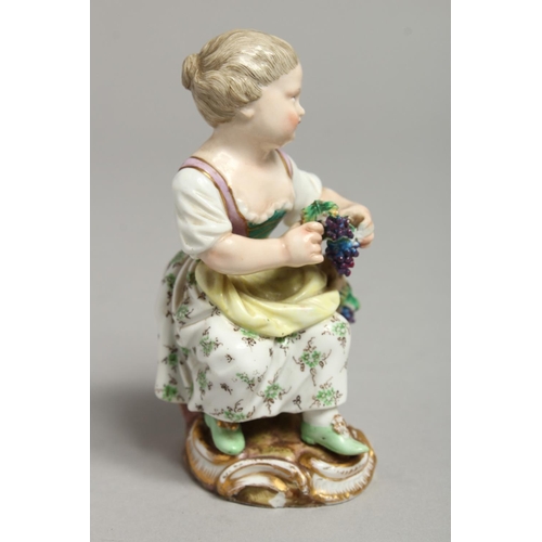 1093 - A 19TH CENTURY MEISSEN FIGURE OF A GIRL holding a bunch of grapes, seated on a tree stump.